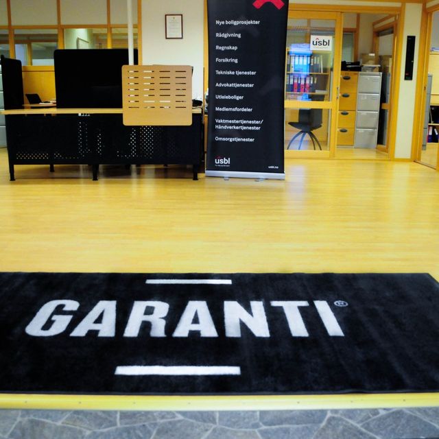 Illustrasjon av logomatten til Garanti